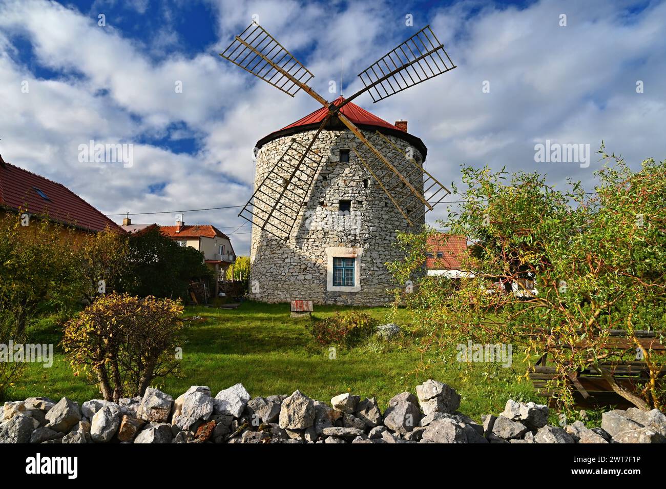 Beautiful old windmill and landscape with the sun. Ostrov u Macochy, Czech Republic. Europe. Stock Photo