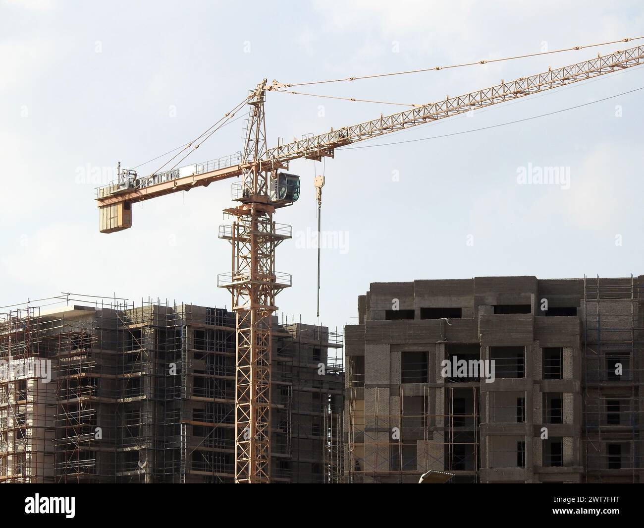 Giza, Egypt, March 15 2024: A construction site of new high rise in Egypt by Orascom construction Zed city Sheikh Zayed, new real estate Egyptian proj Stock Photo
