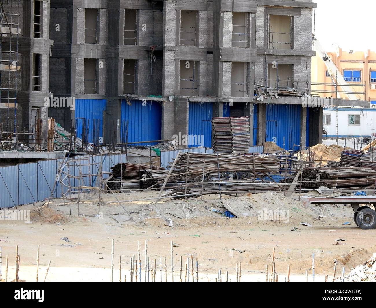 Giza, Egypt, March 15 2024: A construction site of new high rise in Egypt by Orascom construction Zed city Sheikh Zayed, new real estate Egyptian proj Stock Photo