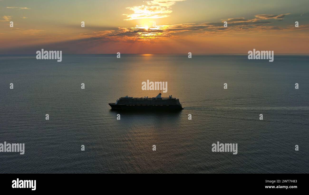 Cruise ship during sunset Stock Photo - Alamy