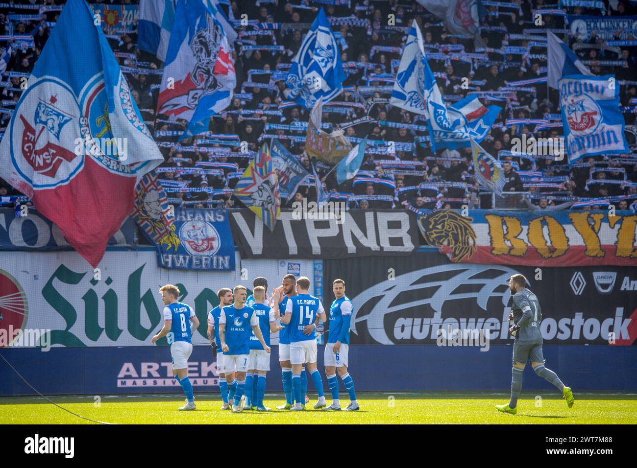 Rostock, Germany. 16th Mar, 2024. Soccer: Bundesliga 2, Hansa Rostock - SpVgg Greuther Fürth, Matchday 26, Ostseestadion. The Rostock players before the start of the match. Credit: Jens Büttner/dpa - IMPORTANT NOTE: In accordance with the regulations of the DFL German Football League and the DFB German Football Association, it is prohibited to utilize or have utilized photographs taken in the stadium and/or of the match in the form of sequential images and/or video-like photo series./dpa/Alamy Live News Stock Photo