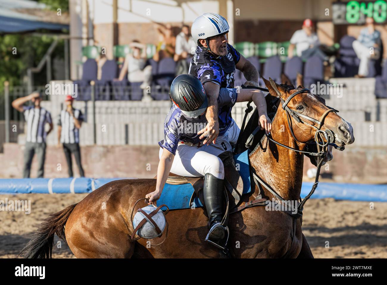 Buenos Aires, Argentina. 9th Mar, 2024. The Argentinian Nicola Taberna of team Cavalier and Spain's Marian of team A&R, seen in action during the final of the Open Horseball Argentina held at the Regimiento de Granaderos a Caballo. The result: Cavalier 5:3 H&R. The International Tournament ''Open Horseball Argentina'' was played at the Regimiento de Granaderos a Caballo General San MartÃ-n, in the city of Buenos Aires, on March 7, 8 and 9 for promotional purposes. It was the prelude to the Horseball World Championship 2025 to be held in Argentina. Three matches were played on each date. The Stock Photo