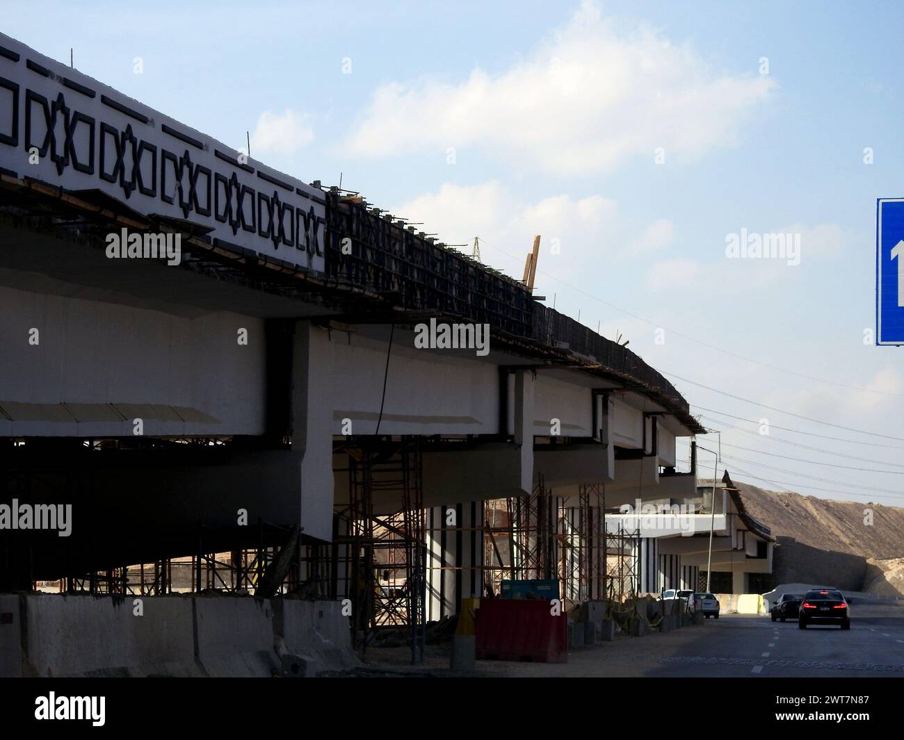 Giza, Egypt, March 15 2024: A new bridge under construction, incomplete traffic bridge for vehicles, Egypt new real estate projects and infrastructure Stock Photo