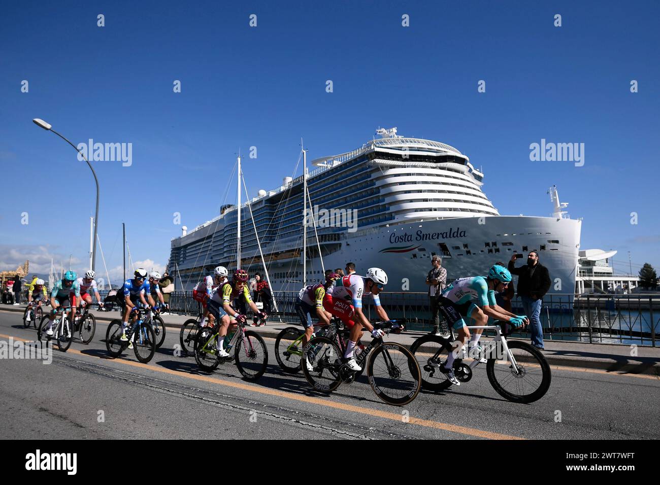 The pack rides during the men's elite race of the Milano-Sanremo one day cycling race (288km) from Pavia and to Sanremo - North West Italy- Saturday, March 16, 2024. Sport - cycling . (Photo by Fabio Ferrari/Lapresse) Credit: LaPresse/Alamy Live News Credit: LaPresse/Alamy Live News Stock Photo