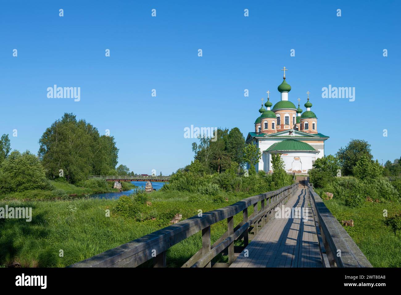 Summer landscape with the ancient Cathedral of the Smolensk Icon of the Mother of God. Olonets, Karelia. Russia Stock Photo