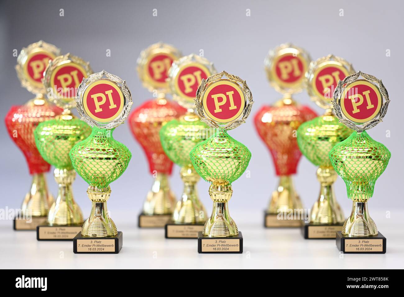 Emden, Germany. 16th Mar, 2024. The trophies lined up for the 7th Emden Pi competition. The aim of the two-day competition on Friday and Saturday is to count as many decimal places of the circle number Pi as possible. Credit: Lars Penning/dpa/Alamy Live News Stock Photo