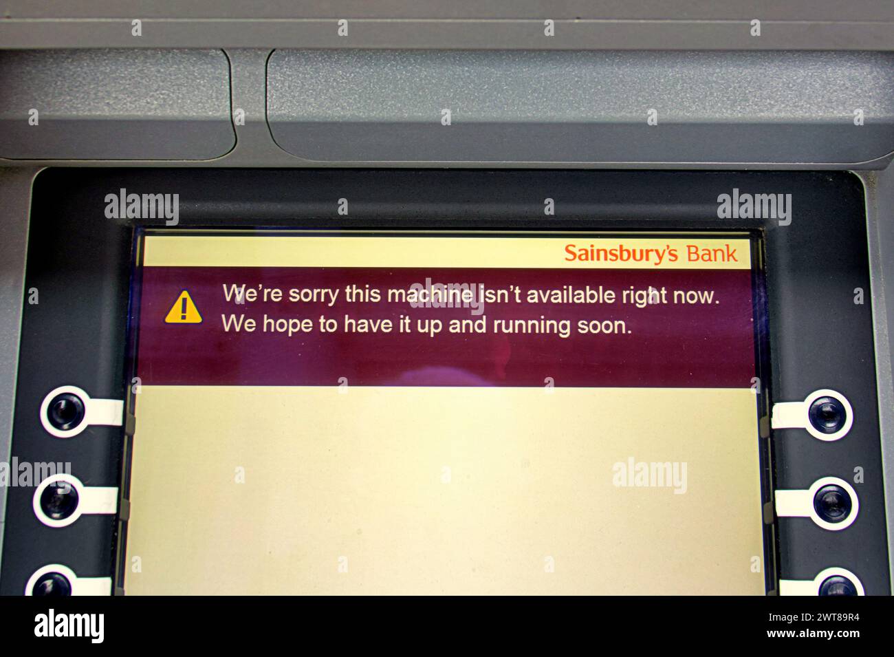 Glasgow, Scotland, UK. 16th March, 2024: Sainsburys systems down at its drumchapel branch as customers are turned away if they cannot pay by cash and cannot withdraw cash from the on-site sainsburys bank terminal and the store was empty for Saturday peak time. In-store lighting was dim as its controlled by the same system and the franchise argos is closed as it cannot process transactions.  Credit Gerard Ferry /Alamy Live News Stock Photo