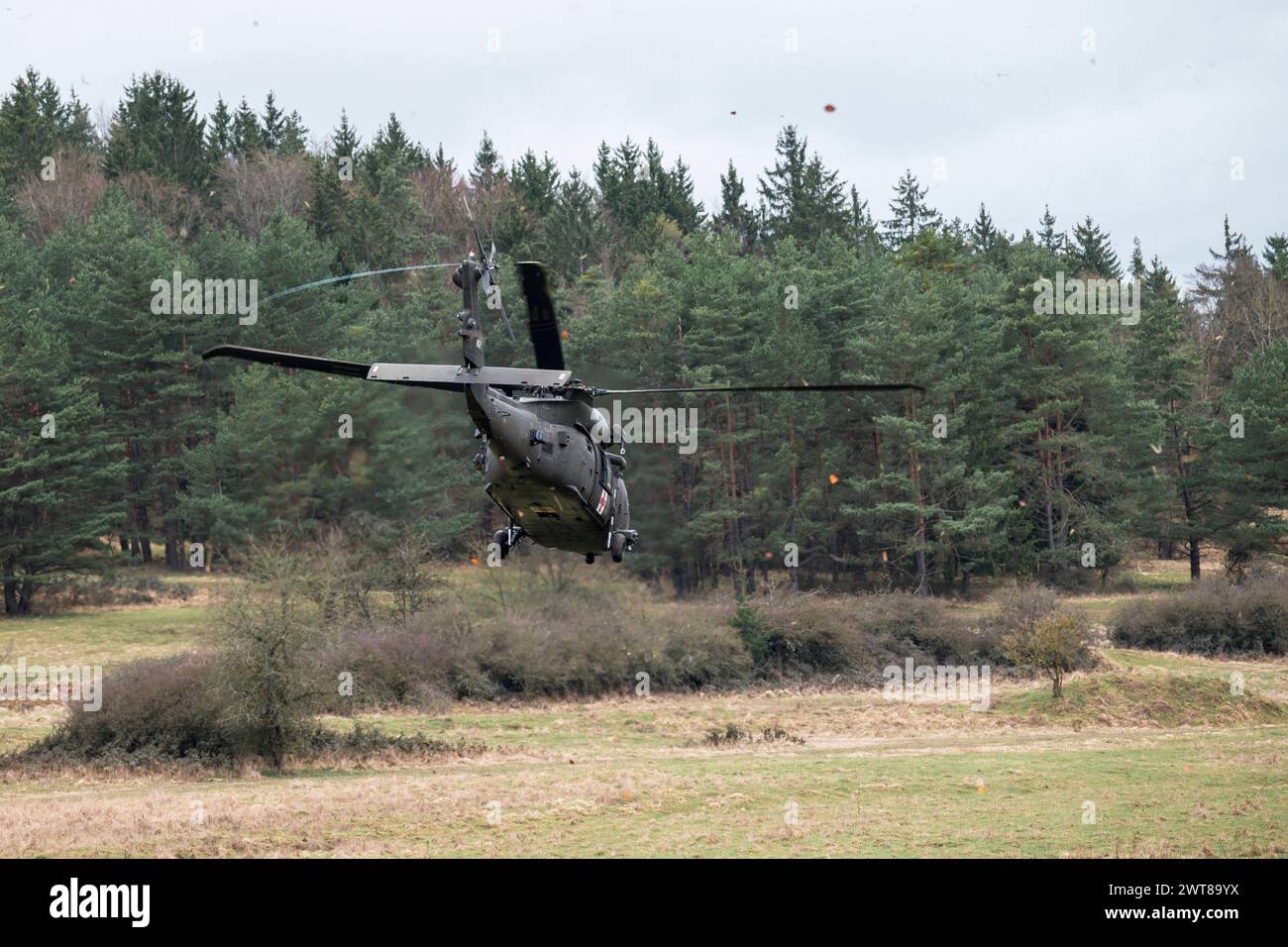 Hohenfels, Germany. 16th Mar, 2024. A Black Hawk transport helicopter takes off to fly a wounded soldier to hospital during the 'Allied Spirit 24' military exercise. The operation took place on the media day of the US Army's military exercise together with the NATO allies with around 6500 participants. Credit: Daniel Vogl/dpa/Alamy Live News Stock Photo