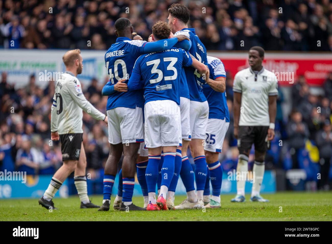 Cameron Burgess of Ipswich Town celebrates with teammates during the Sky Bet Championship match between Ipswich Town and Sheffield Wednesday at Portman Road, Ipswich on Saturday 16th March 2024. (Photo: David Watts | MI News) Credit: MI News & Sport /Alamy Live News Stock Photo