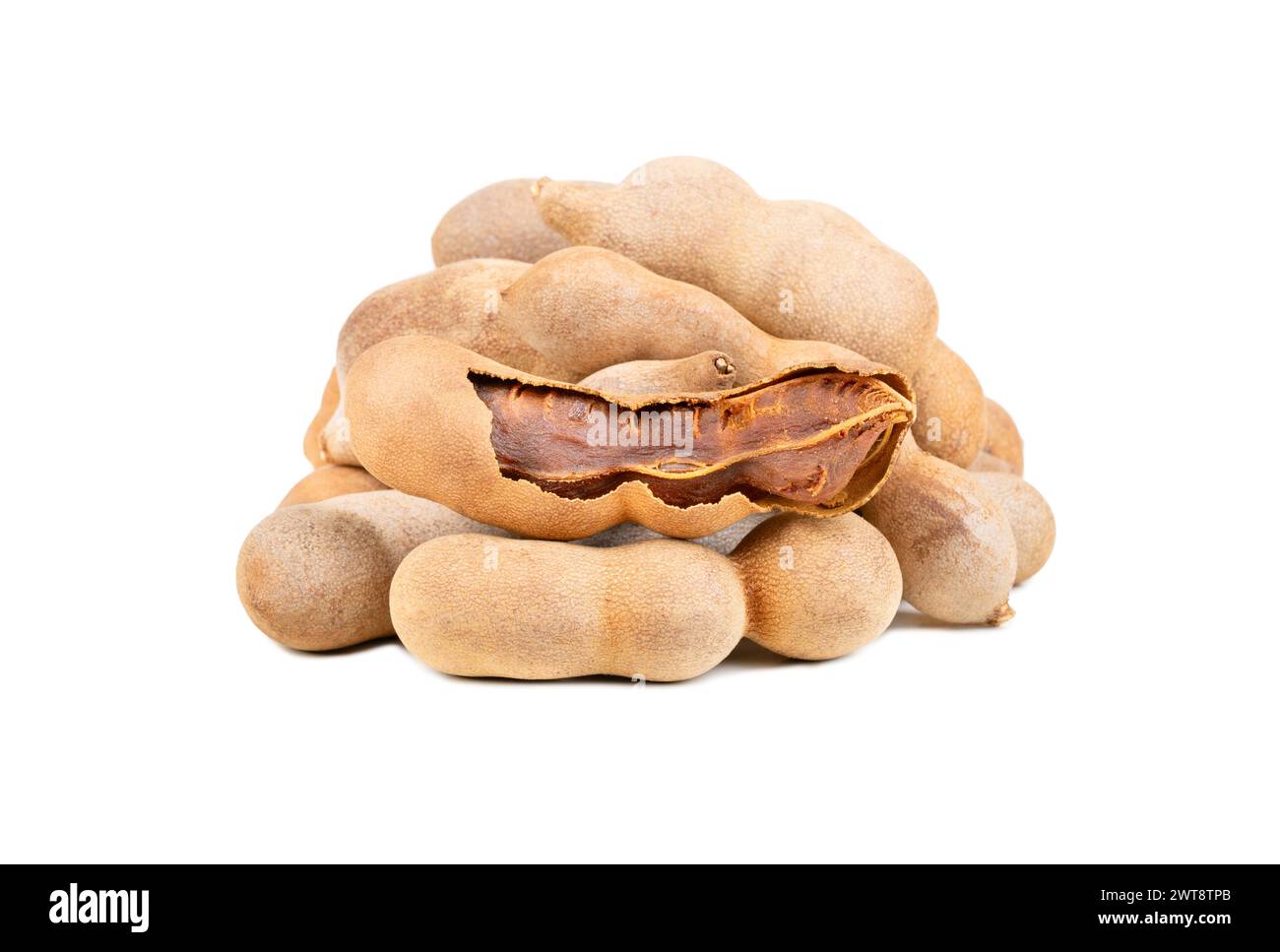 Bunch of tamarind fruits in shell on white background Stock Photo