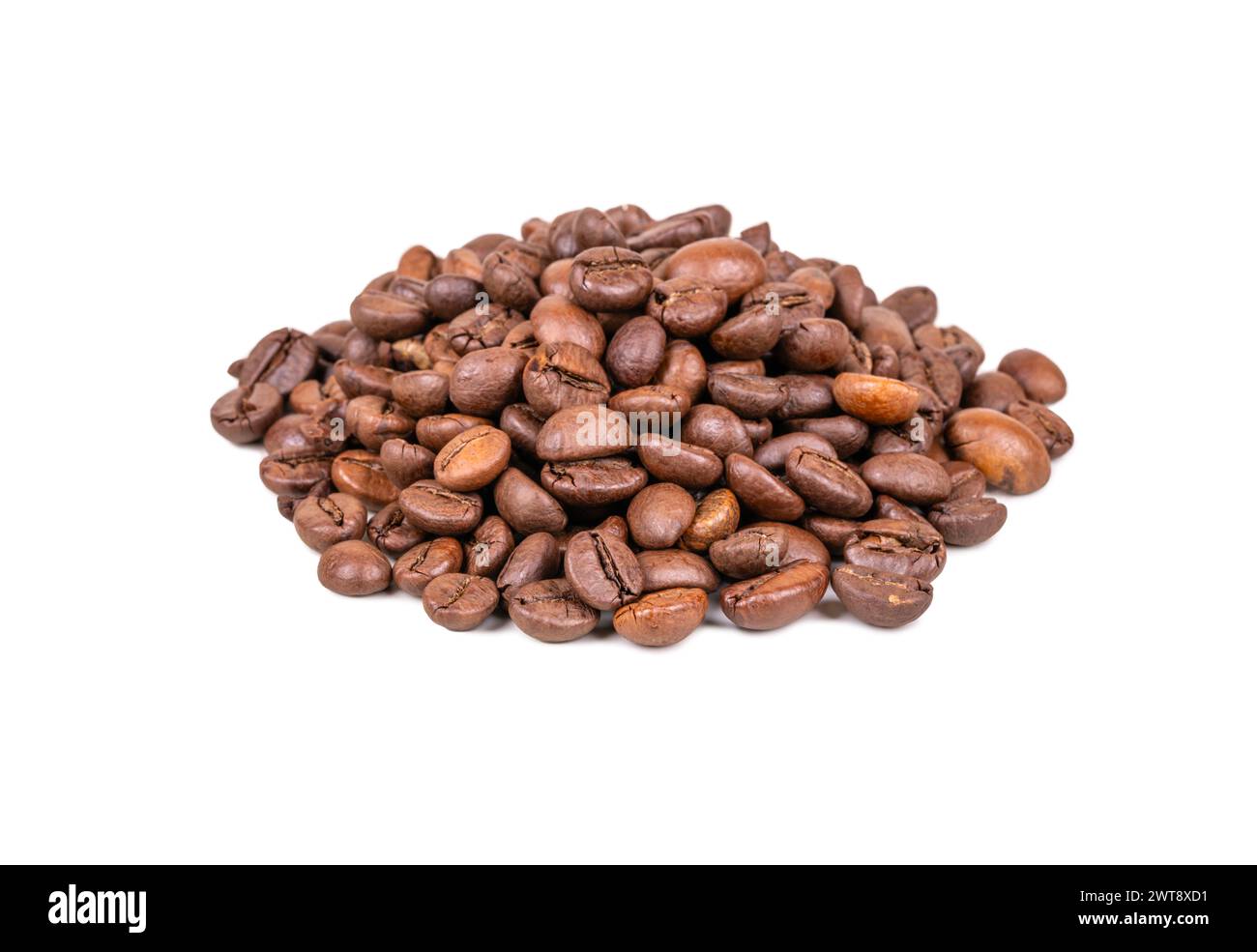 Pile of roasted arabica coffee beans isolated on white background Stock Photo