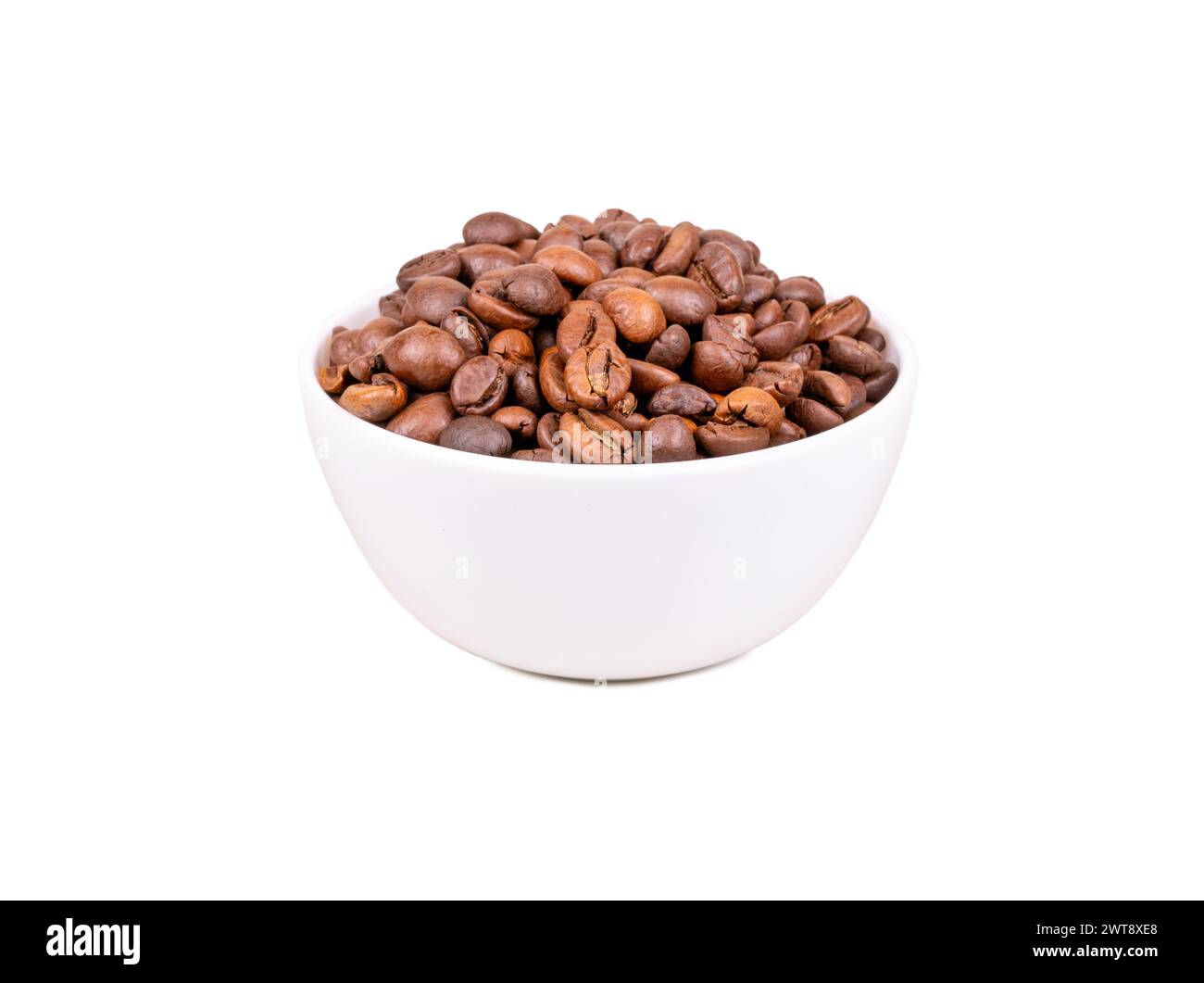 Roasting Arabica coffee beans in a light bowl isolated on white background Stock Photo