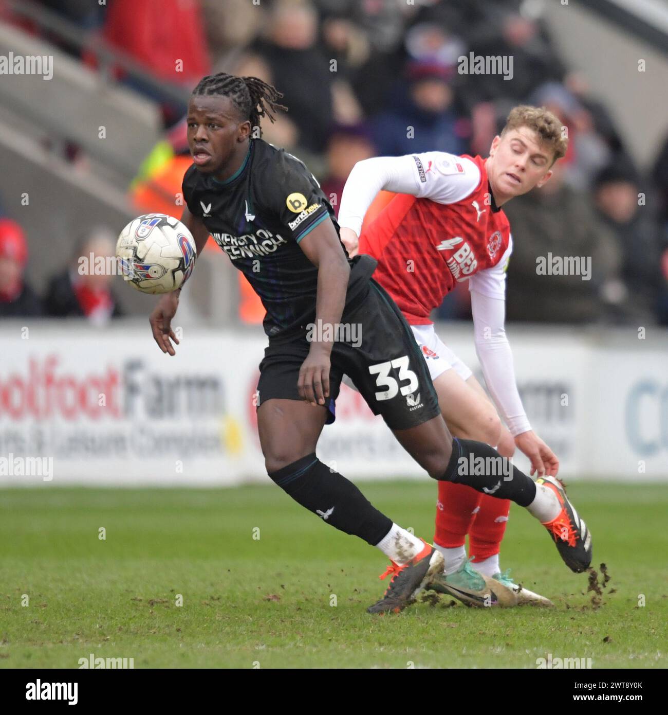 Fleetwood, England. 16th Mar 2024. Karoy Anderson of Charlton Athletic and Gavin Kilkenny during the Sky Bet EFL League One fixture between Fleetwood Town and Charlton Athletic. Kyle Andrews/Alamy Live News Stock Photo
