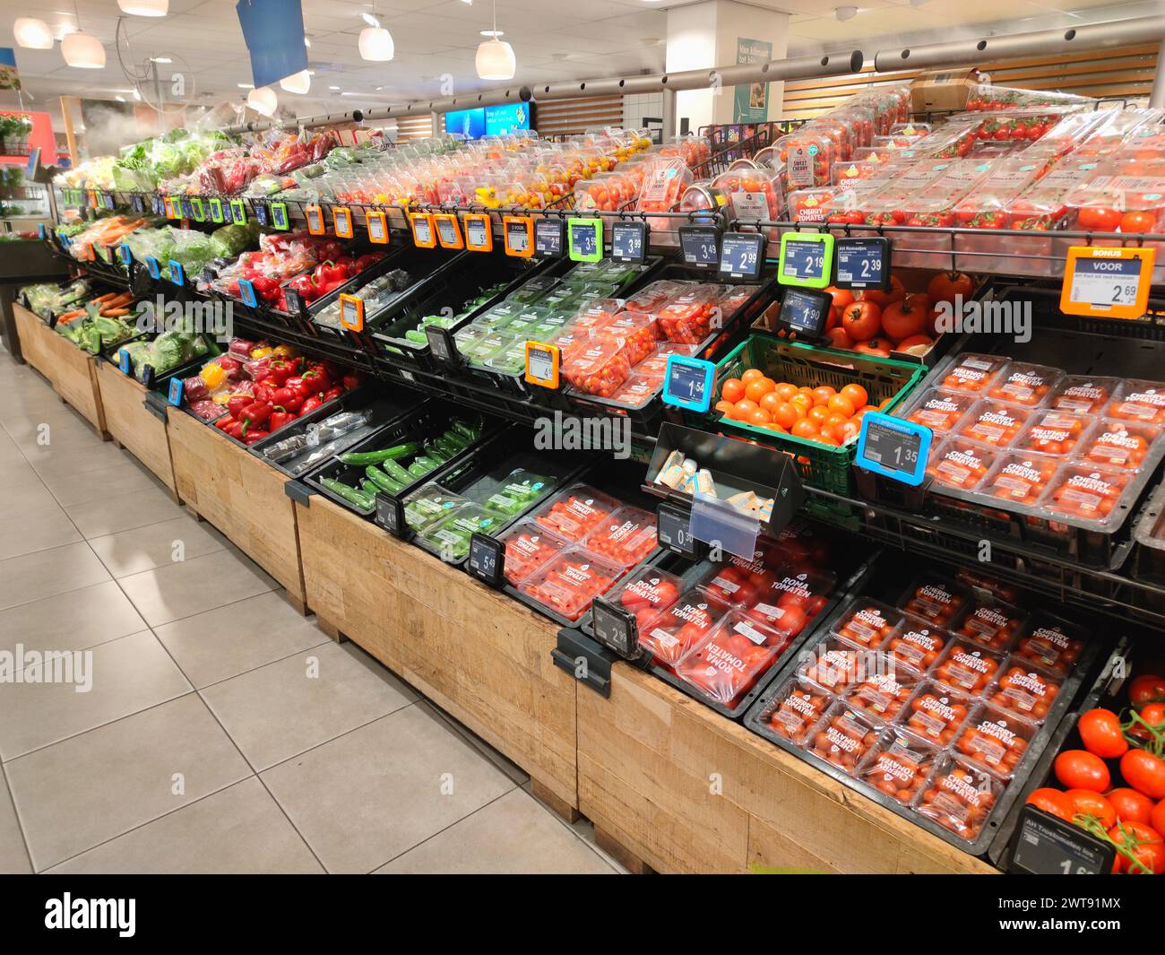 Vegetables department in a supermarket in Scheveningen, Netherlands. Stock Photo