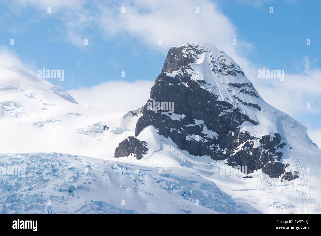 Snow covered mountain in Antarctica. Stock Photo