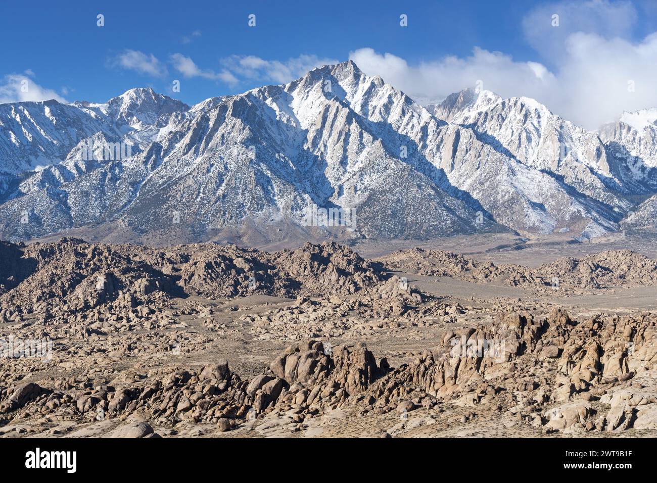 snow covered Lone Pine Peak and Mount Langley rise above the Alabama Hills Near Lone Pine in the Owens Valley of California Stock Photo