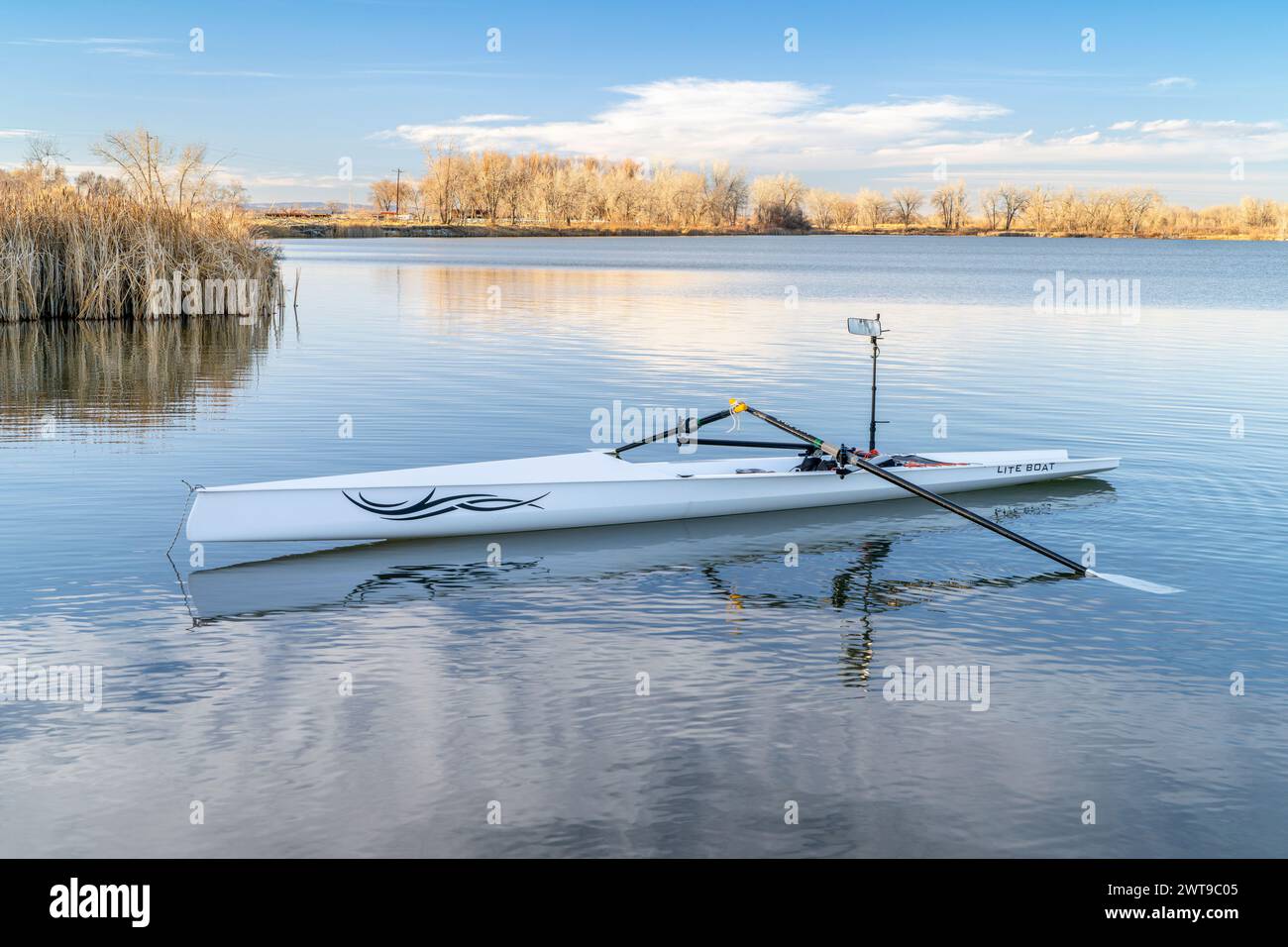 Fort Collins, CO, USA - March 1, 2024: Coastal rowing shell by Liteboat on a lake in northern Colorado in winter or early spring scenery. Stock Photo