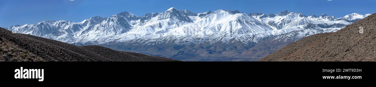 panorama of eastern Sierra Nevada mountains Palisade range with snow from highway 168 near Westgard Pass across the Owens Valley Stock Photo