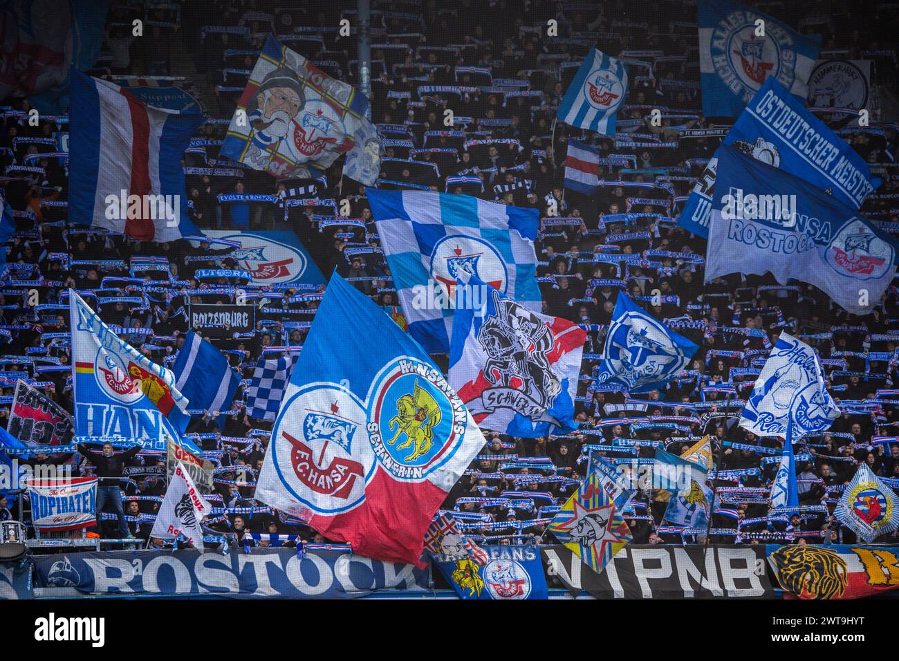 Rostock, Germany. 16th Mar, 2024. Soccer: Bundesliga 2, Hansa Rostock - SpVgg Greuther Fürth, Matchday 26, Ostseestadion. Fans of Hansa Rostock. Credit: Jens Büttner/dpa - IMPORTANT NOTE: In accordance with the regulations of the DFL German Football League and the DFB German Football Association, it is prohibited to utilize or have utilized photographs taken in the stadium and/or of the match in the form of sequential images and/or video-like photo series./dpa/Alamy Live News Stock Photo