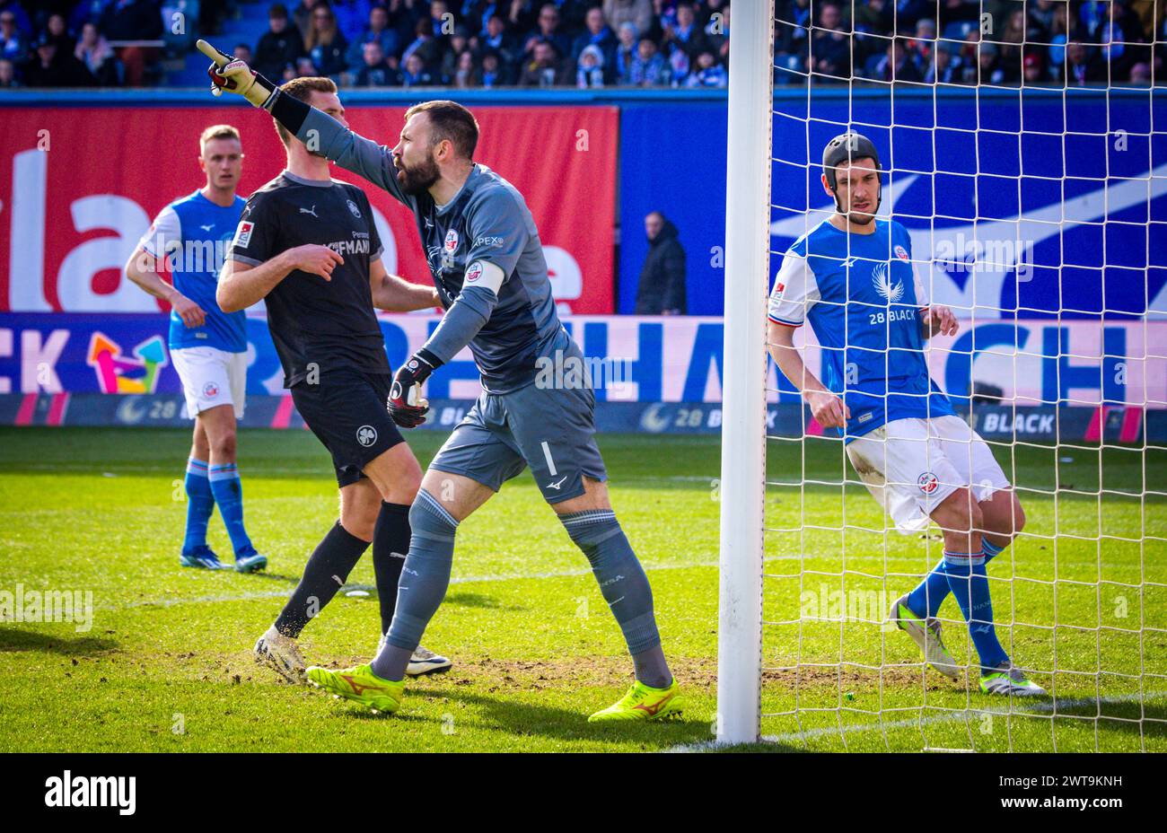 Rostock, Germany. 16th Mar, 2024. Soccer: Bundesliga 2, Hansa Rostock - SpVgg Greuther Fürth, Matchday 26, Ostseestadion. Rostock goalkeeper Markus Kolke. Rostock wins 1 : 0 against Greuther Fürth. Credit: Jens Büttner/dpa - IMPORTANT NOTE: In accordance with the regulations of the DFL German Football League and the DFB German Football Association, it is prohibited to utilize or have utilized photographs taken in the stadium and/or of the match in the form of sequential images and/or video-like photo series./dpa/Alamy Live News Stock Photo