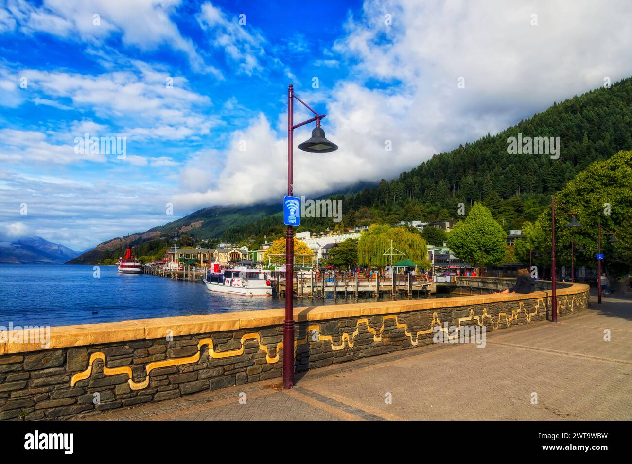 Waterfront of Lake Wakatipu at Queenstown downtown in New Zealand. Stock Photo