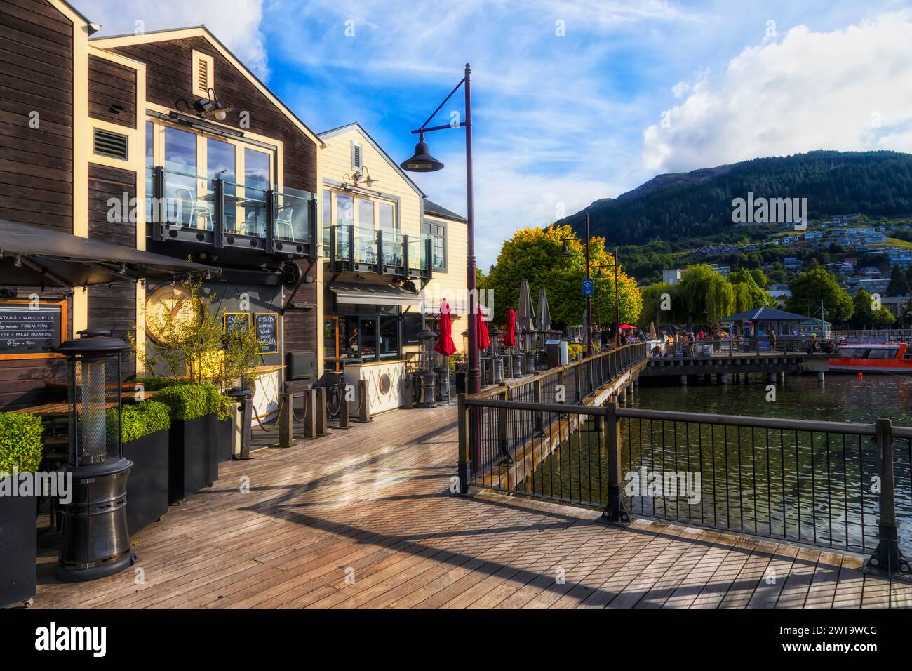 Queentston jet timber boardwalk with cafes and pubs on downtown waterfront. Stock Photo