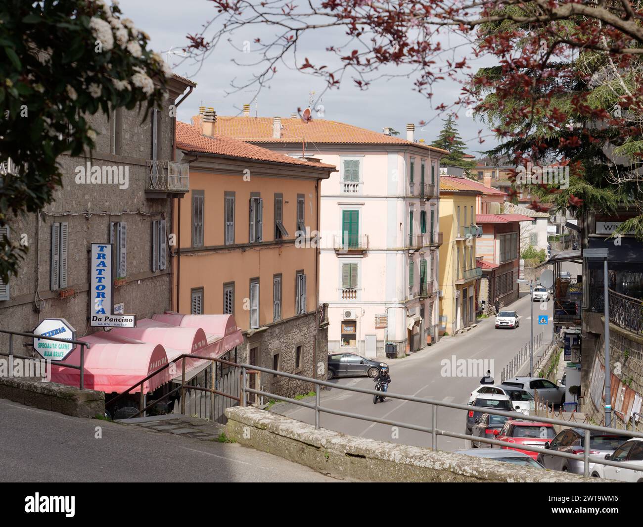 Elevated view of a street in Montefiascone with restaurants and steep walls, Lazio Region, Italy. March 2024 Stock Photo