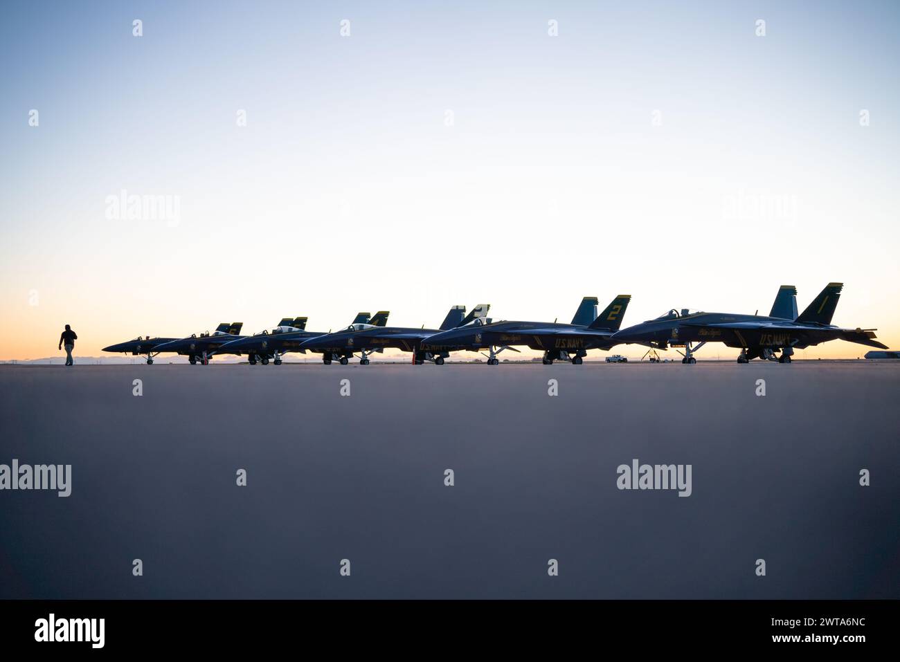 U.S. Navy Blue Angels are parked during sunrise at Travis Air Force Base, California, March 12 ...