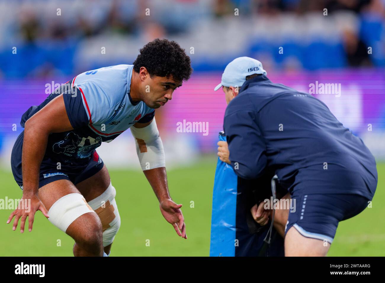 Sydney, Australia. 16th Mar, 2024. Tane Edmed of the Waratahs warms up before the Super Rugby Pacific 2024 Rd4 match between the Waratahs and the Blues at Allianz Stadium on March 16, 2024 in Sydney, Australia Credit: IOIO IMAGES/Alamy Live News Stock Photo