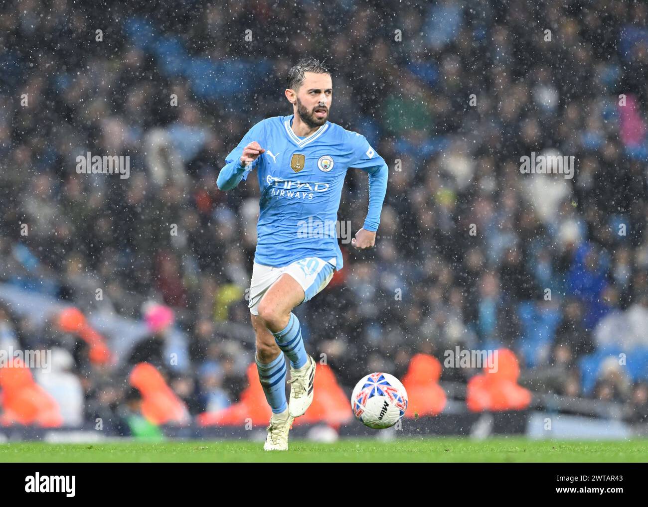 Bernardo Silva of Manchester City breaks forward with the ball, during