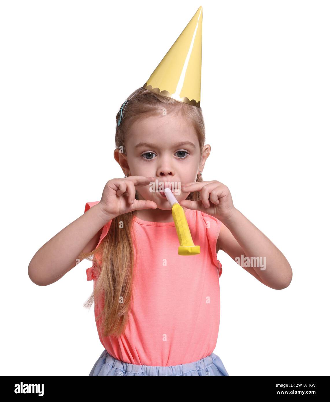 Birthday celebration. Cute little girl in party hat with blower on ...