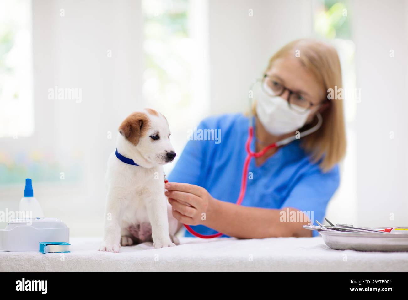 Gogs Getting Injection Baby doctor ear examination hi-res stock photography and images - Alamy