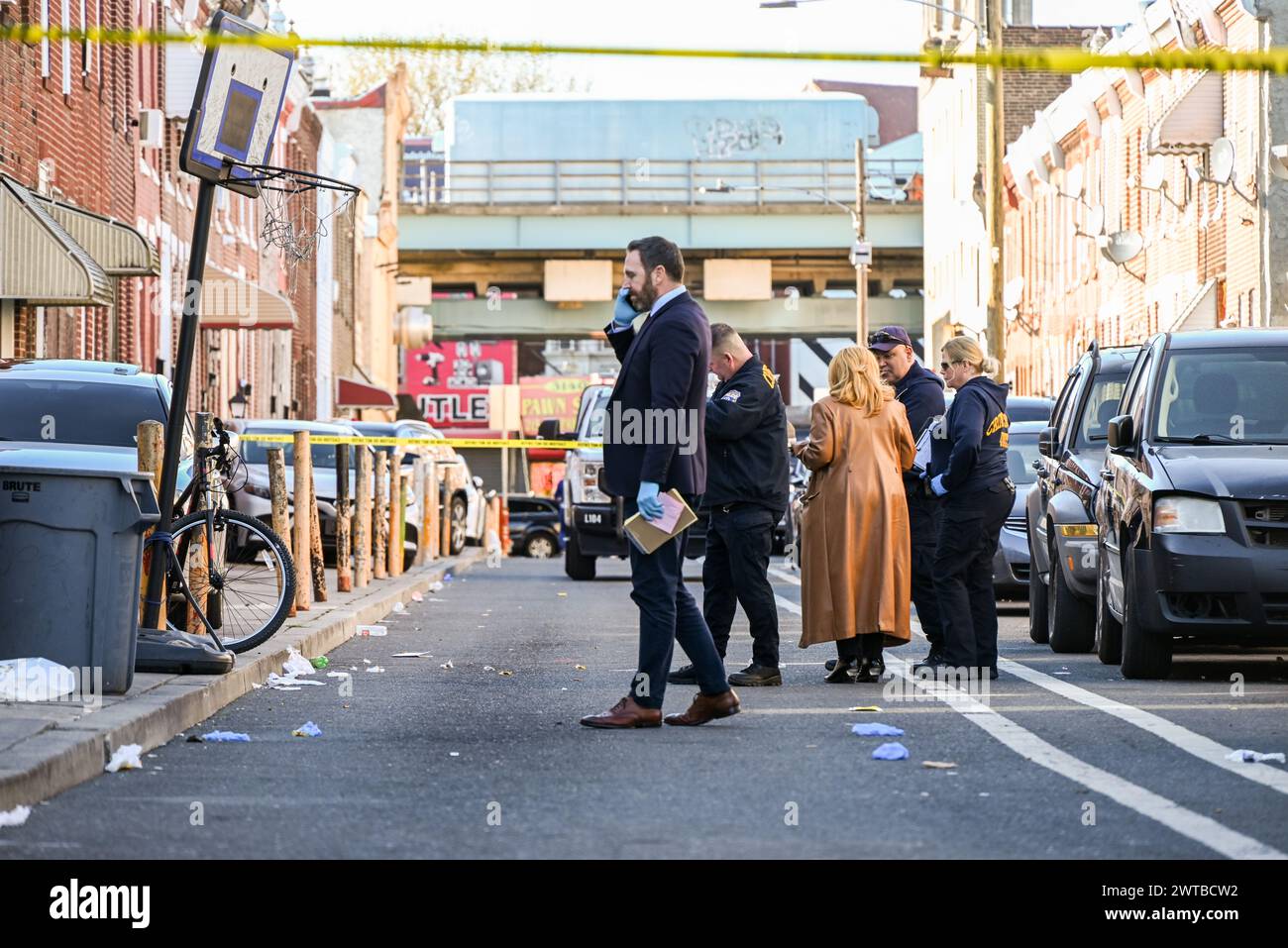 Authorities scour the area for clues at the crime scene on East