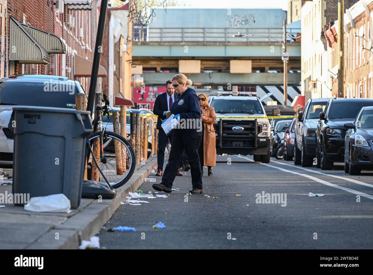Authorities scour the area for clues at the crime scene on East
