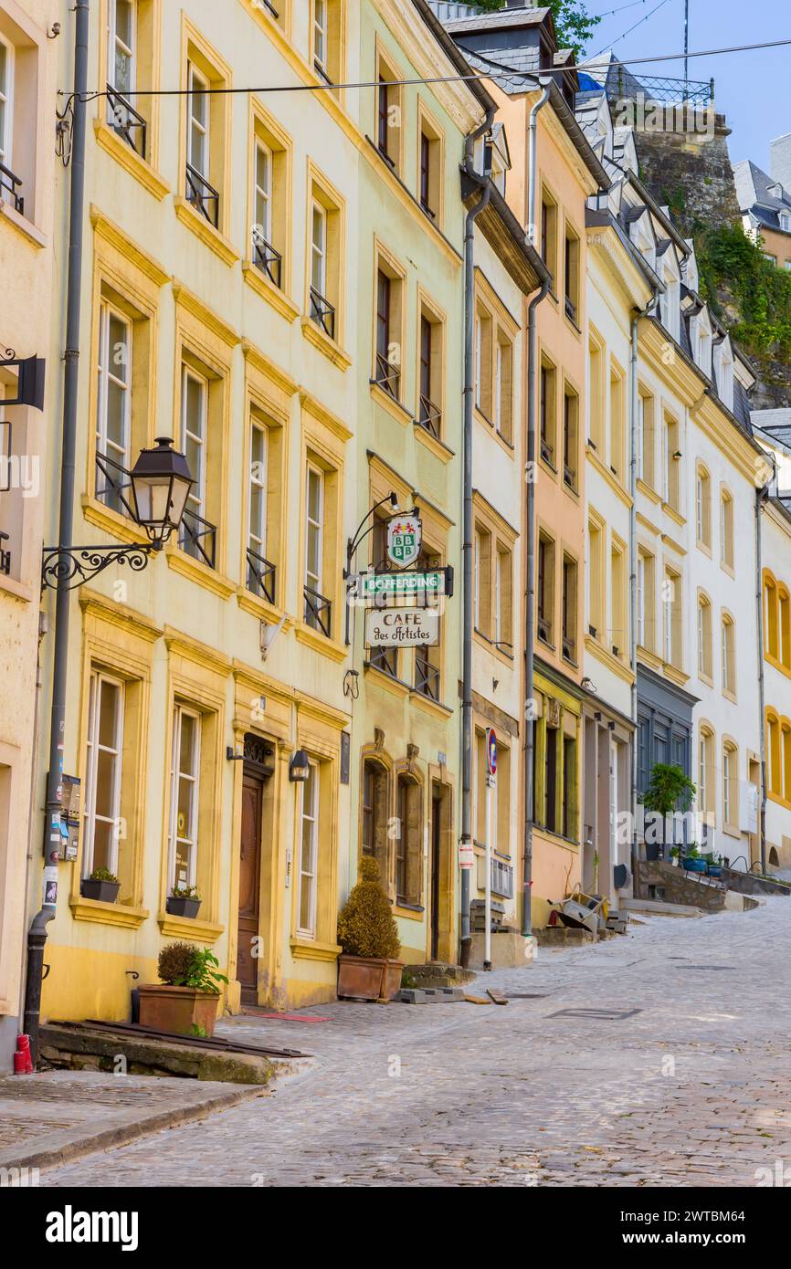 Colorful houses at a steep cobblestoned street in Luxembourg city Stock Photo