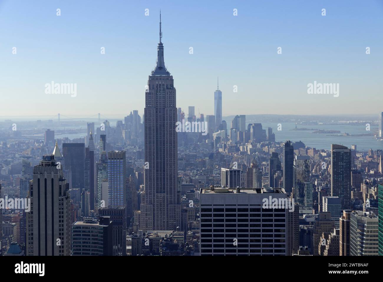 Observation deck of the Rockefeller Center, view of the Empire State Building and surrounding skyscrapers in daylight, Manhattan, New York City, New Stock Photo