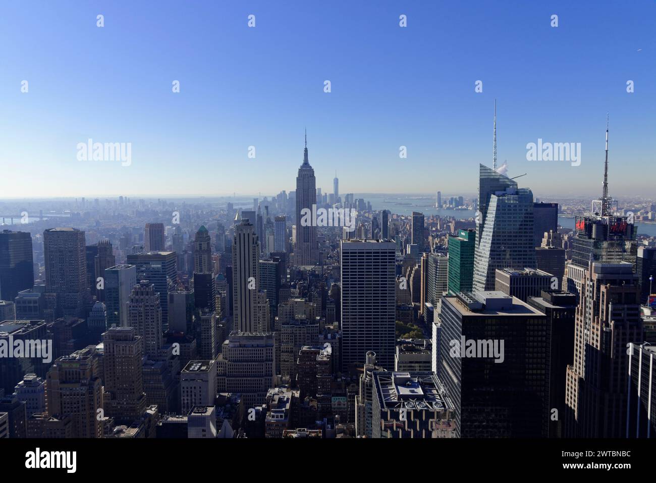 Viewing terrace of the Rockefeller Center, Wide panorama of the skyline with Empire State Building and clear sky, Manhattan, New York City, New York Stock Photo