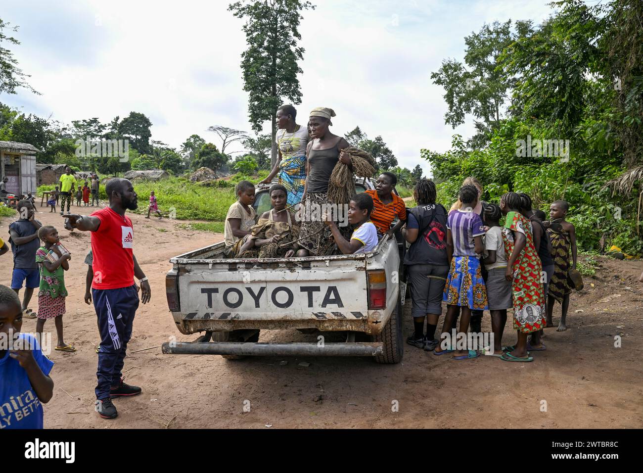 Pygmies of the Baka or BaAka people with their hunting nets on a pick-up truck, Bayanga, Sangha-Mbaere Prefecture, Central African Republic Stock Photo