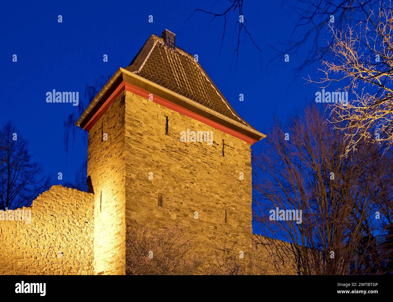 Illuminated Trinsen Tower in the evening, Old Town, Ratingen, Bergisches Land, North Rhine-Westphalia, Germany Stock Photo