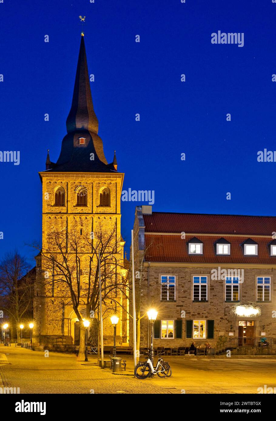 Market square with St Peter and Paul Church and community centre in the evening, Old Town, Ratingen, Bergisches Land, North Rhine-Westphalia, Germany Stock Photo
