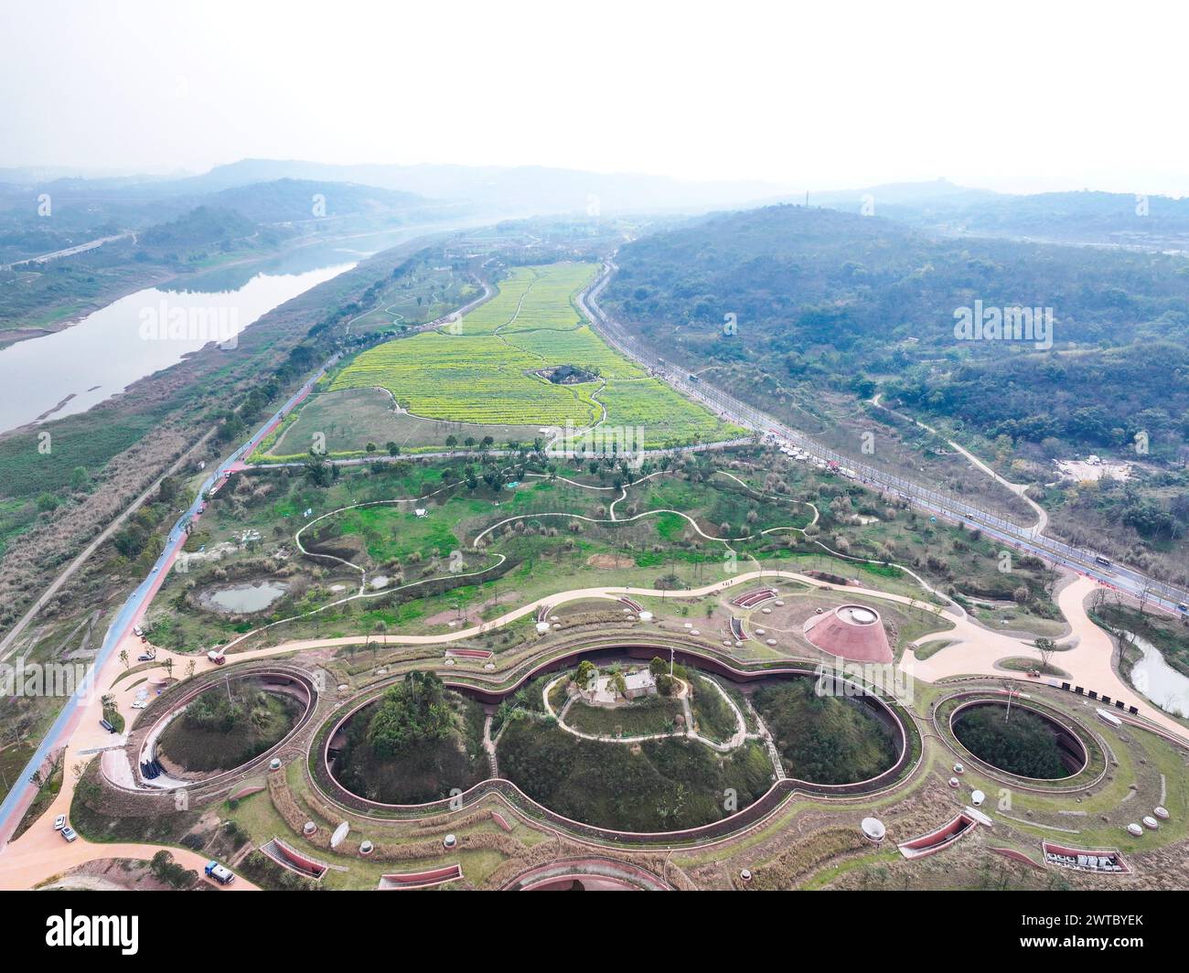 (240317) -- CHONGQING, March 17, 2024 (Xinhua) -- An aerial drone photo shows a view of Guangyang Isle in southwest China's Chongqing, March 16, 2024. Guangyang Isle, the most extensive green island in the upper reaches of the Yangtze River, has been turned into an ecological restoration and protection 'classroom' for ecotourists and school children.The local ecosystem and biodiversity were once seriously threatened due to real-estate projects in the area. However, the local government brought harmful projects of this sort to a halt in 2017, starting the restoration of the environment on the i Stock Photo
