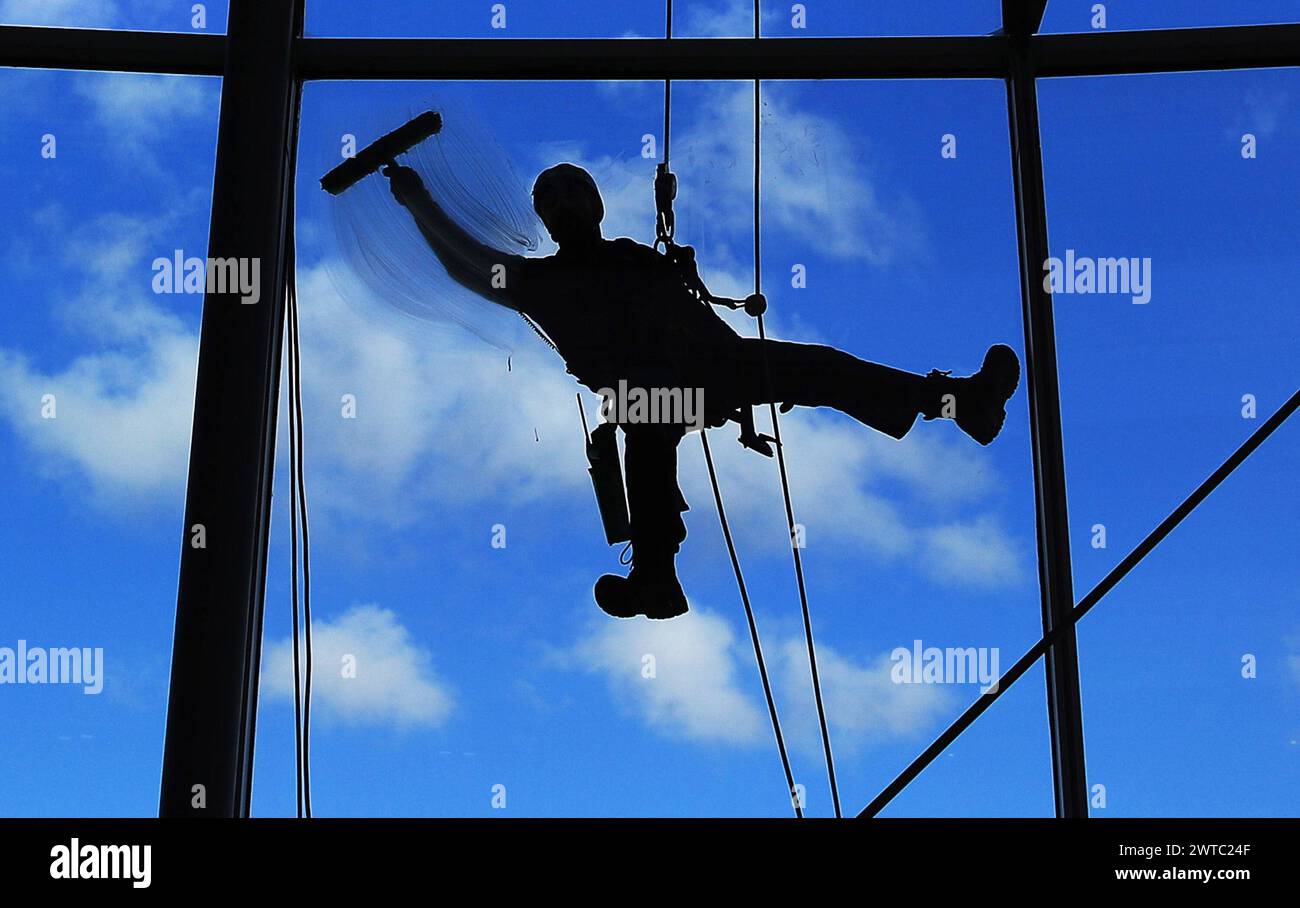 Undated file photo of a window cleaner Jobs for window cleaners
