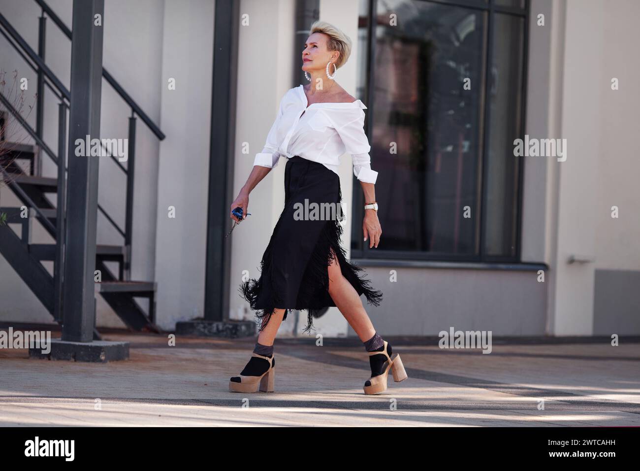 Woman white shirt black skirt hi-res stock photography and images - Alamy