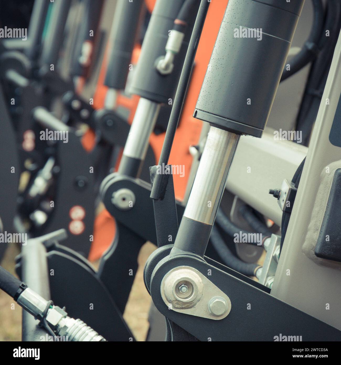 Black pistons or actuators in pneumatic or hydraulic machine ...