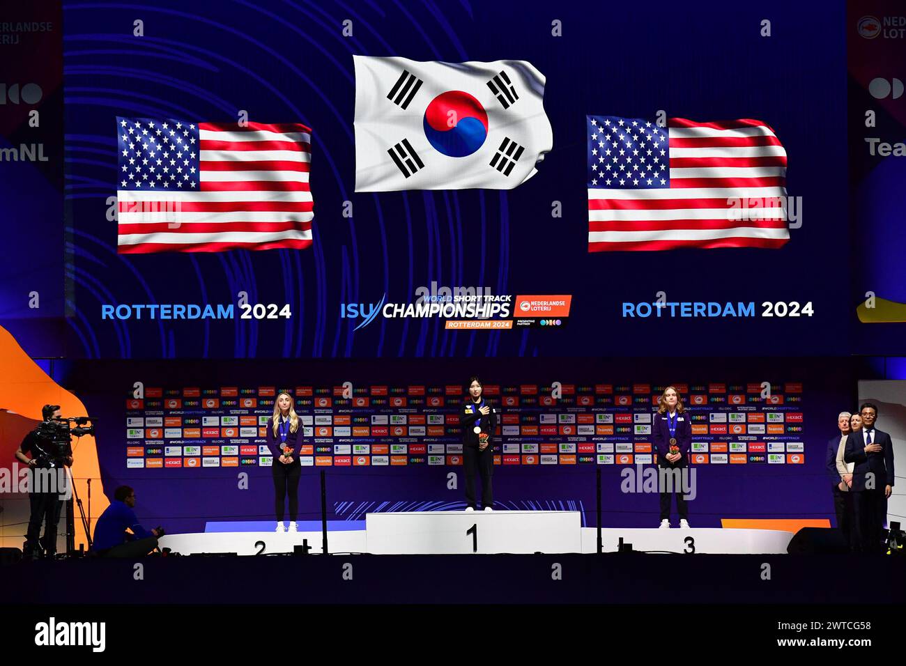 The medal ceremony for the womens 1000m on day 2 where KIM Gilli KOR takes gold, SANTOS-GRISWOLD Kristen USA silver and STODDARD Corinne USA bronze during the World Short Track Speed Skating Championship from Rotterdam on 16 March 2024. Photo by Phil Hutchinson. Editorial use only, license required for commercial use. No use in betting, games or a single club/league/player publications. Credit: UK Sports Pics Ltd/Alamy Live News Stock Photo