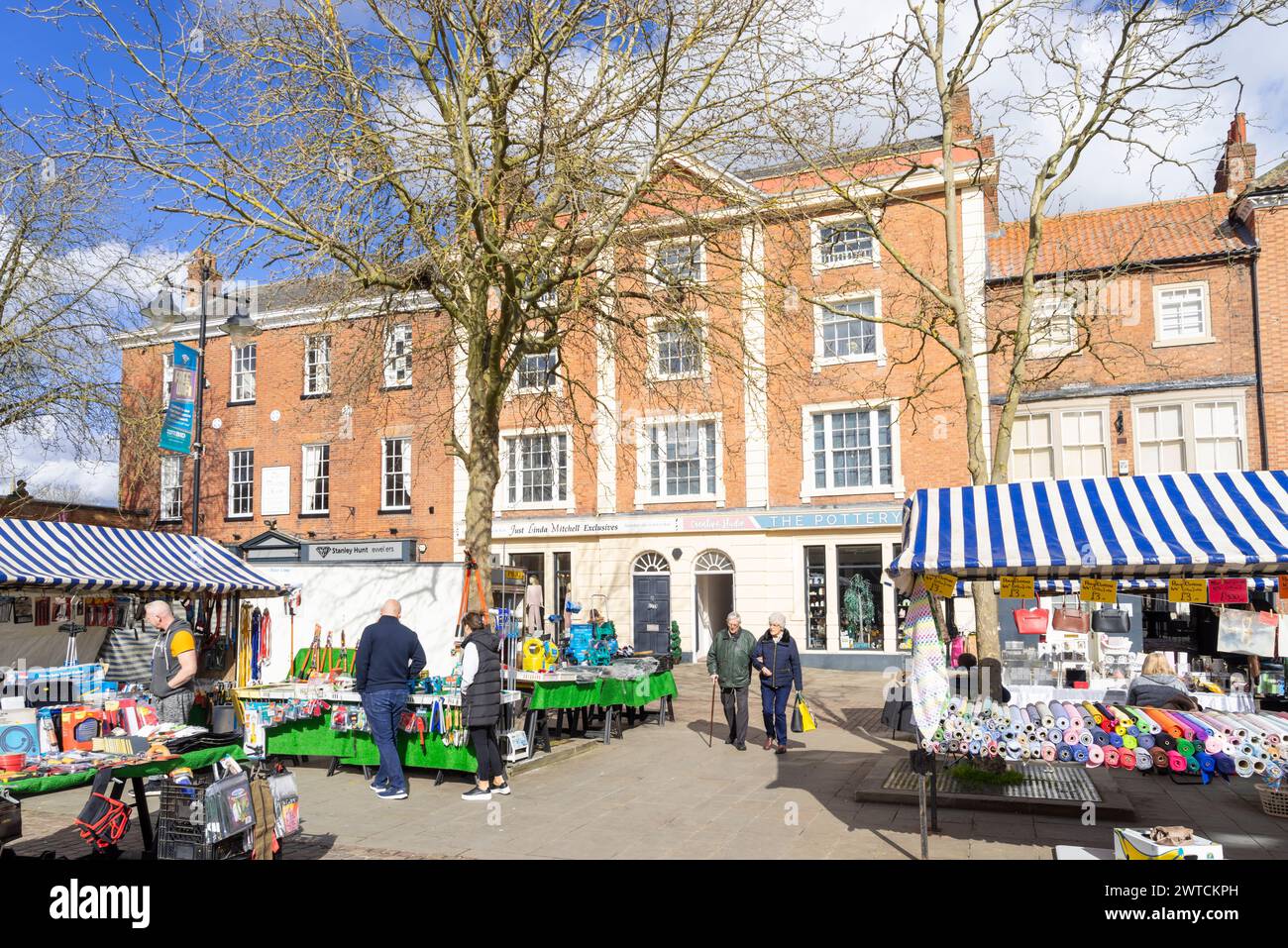 Retford Market Square with people shopping at the busy Market Stalls in ...