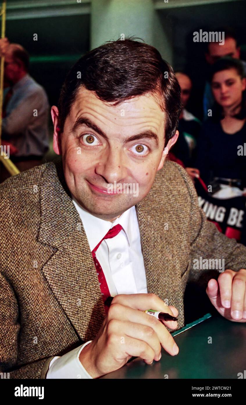 The British Comedian Rowan Atkinson doing an in store appearance as iMr Bean Sydney Australia 1995, signing autographs, portraits. Stock Photo
