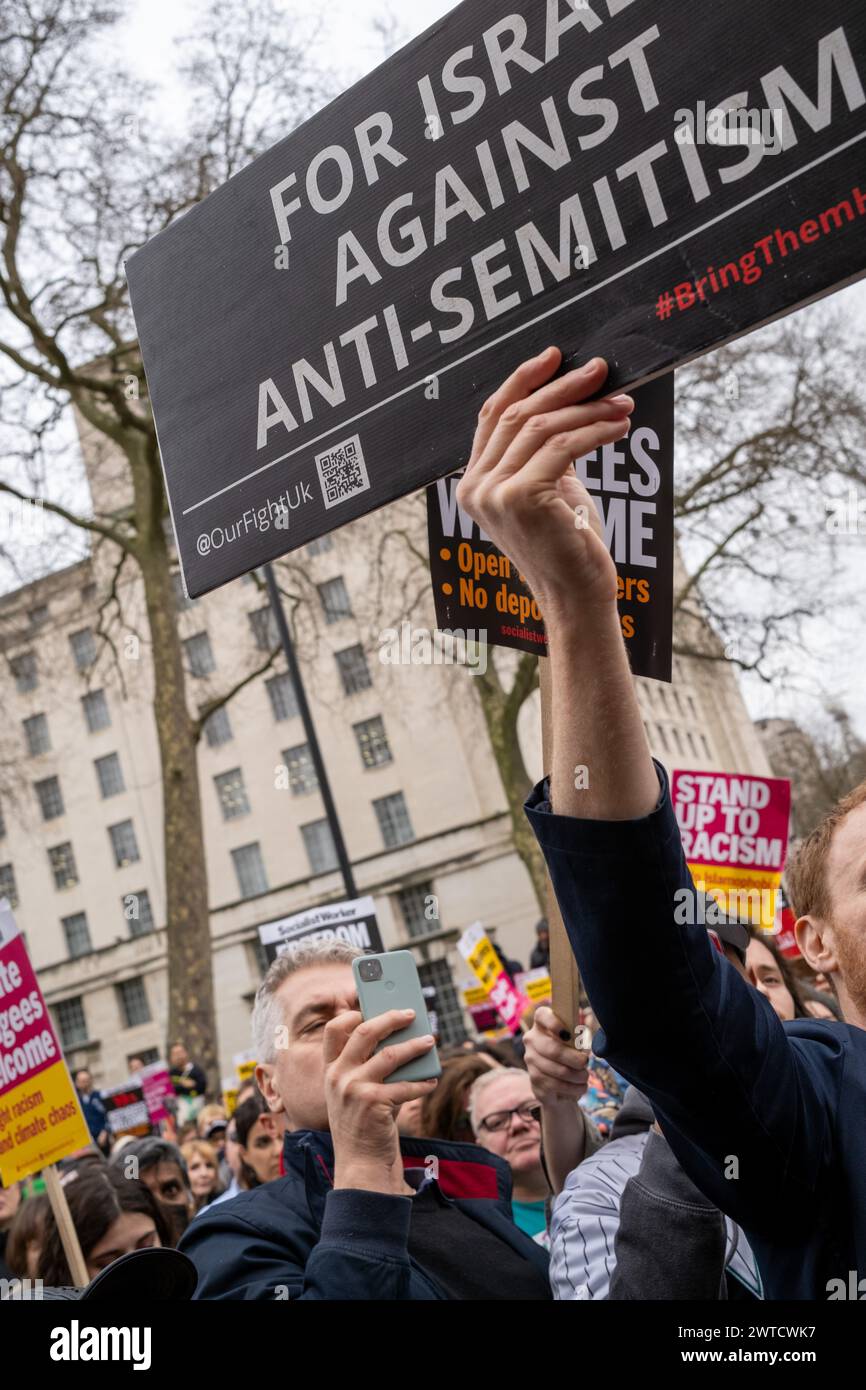 London, UK, 16th, February, 2024. Two individual's hold up pro-Israel ...