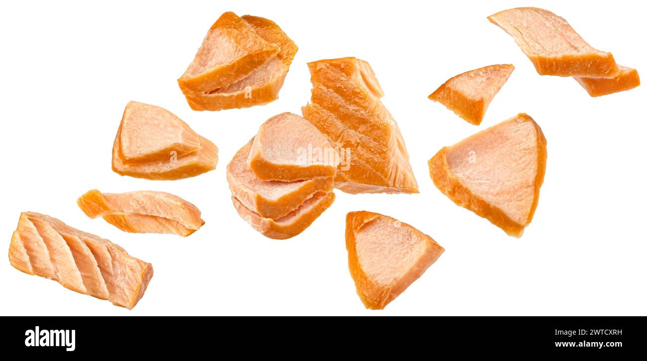 Hot smoked salmon pieces isolated on white background Stock Photo