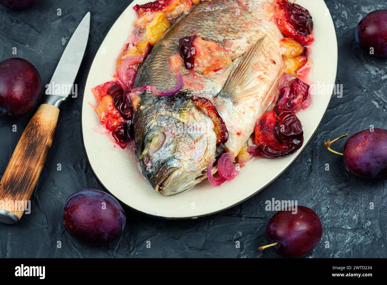 Bikad Fish Baked seabass fish hi-res stock photography and images - Alamy